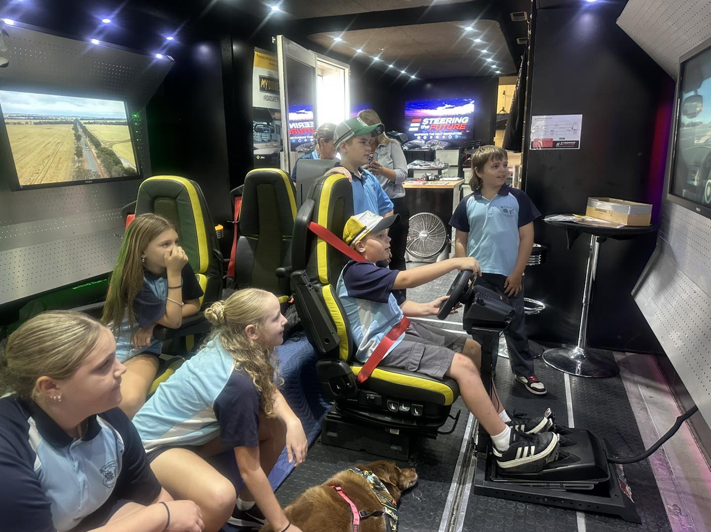Students inside the Steering the Future roadshow trailer